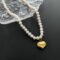 [鈦鋼]設計愛心珍珠鎖骨鏈 - 04-G8 天然爱心珍珠项链 钛钢材质 金色