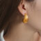 [316L鈦鋼]輕奢鏤空水滴形耳環F1010 - F1010-金色耳环
